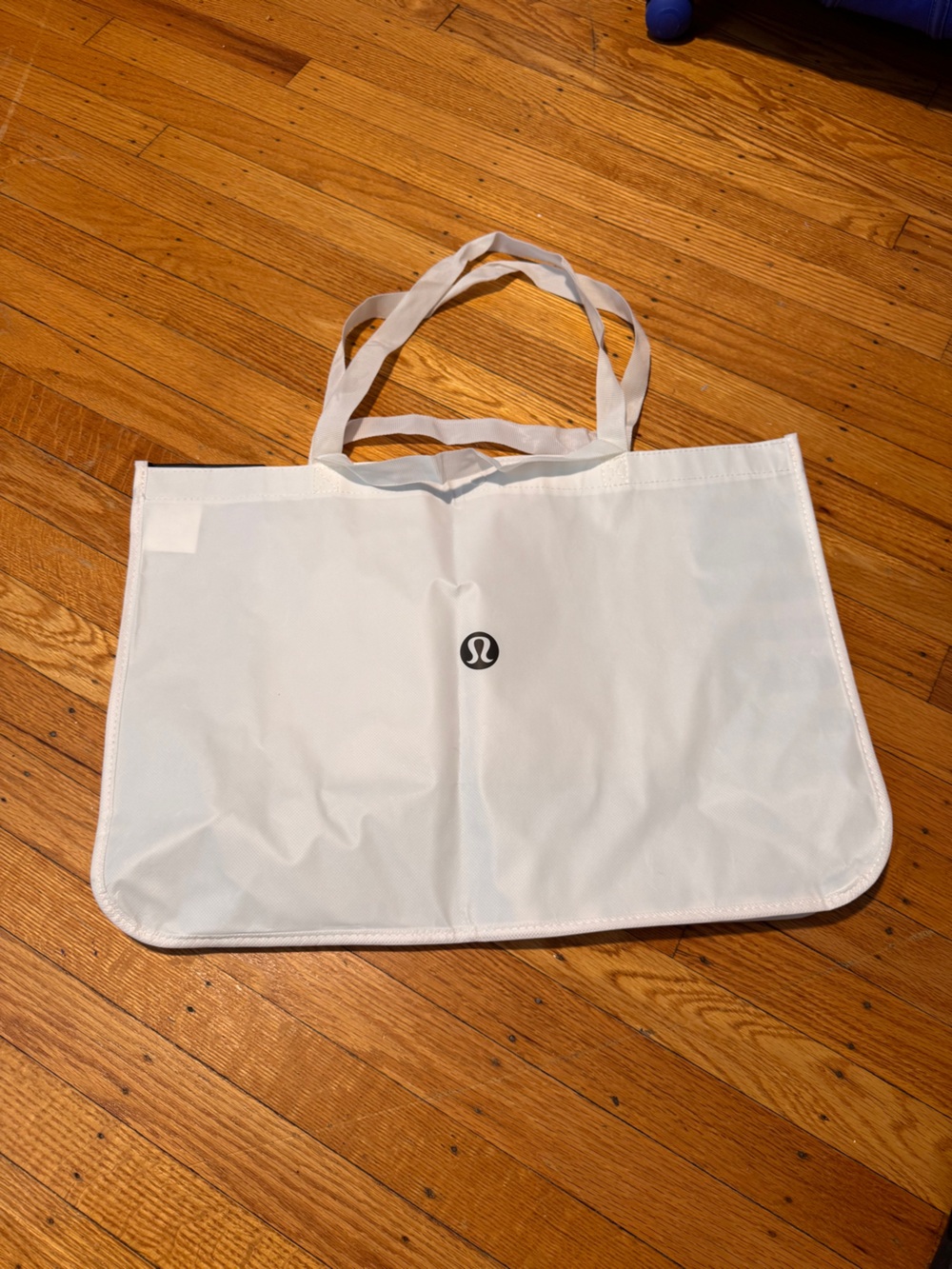 5/25$ Lululemon White Logo Wide Tote Bag